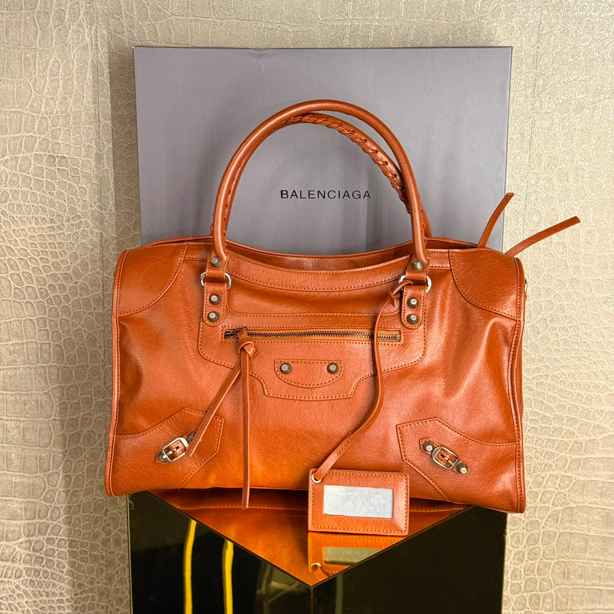 BALENCIAGA
Cognac Calfskin Leather Riva City Bag